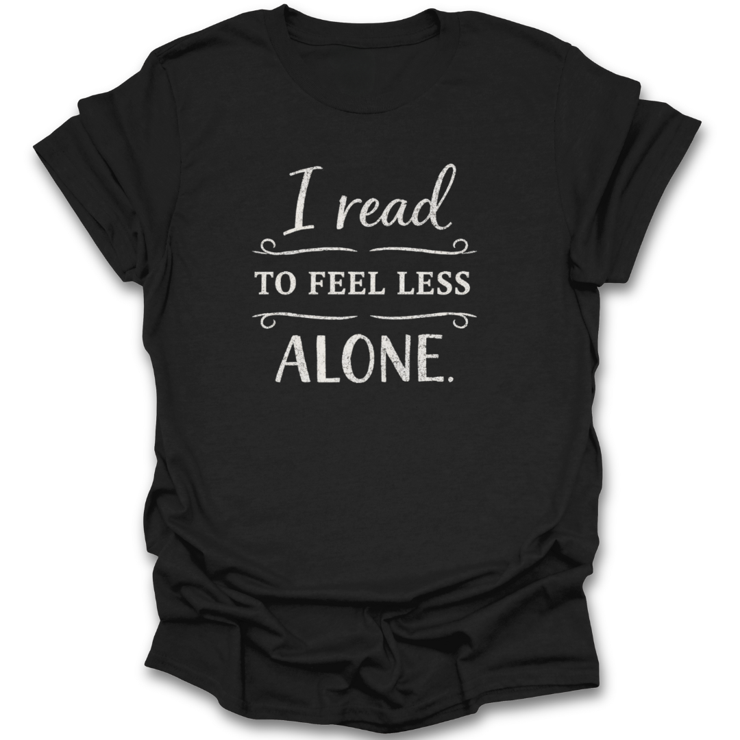 Black t-shirt with white text 'I read to feel less alone' on a white background book reading literary t shirt