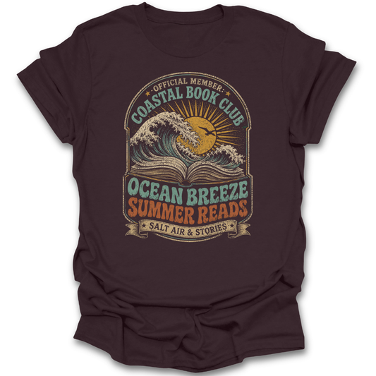 Brown t-shirt with 'Coastal Book Club' graphic design featuring a wave and book.
