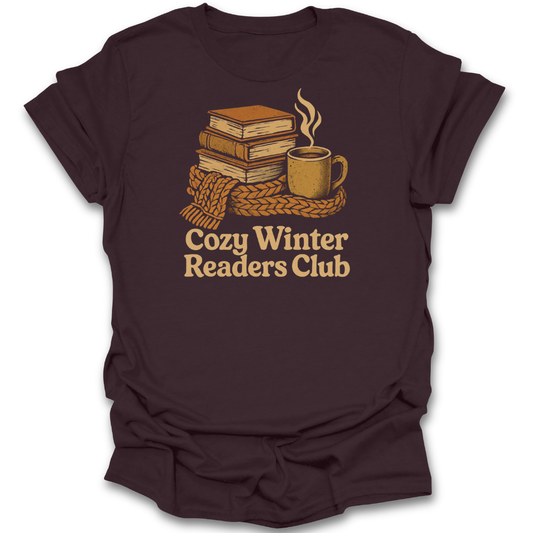 Brown t-shirt with 'Cozy Winter Readers Club' graphic featuring books and a mug. cozy book reading literary t shirt