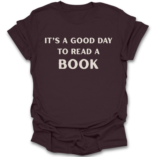Brown t-shirt with 'It's a good day to read a book' text on a white background book reading literary t shirt