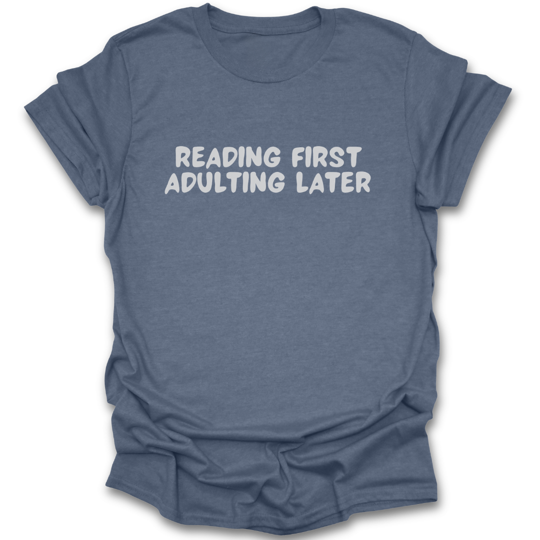 Blue t-shirt with 'Reading First, Adulting Later' text on a white background funny book reading literary t shirt