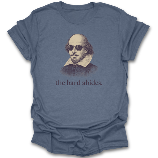 Blue t-shirt with a graphic of Shakespeare wearing sunglasses and the text 'the bard abides' on a white background. funny book reading literary t shirt