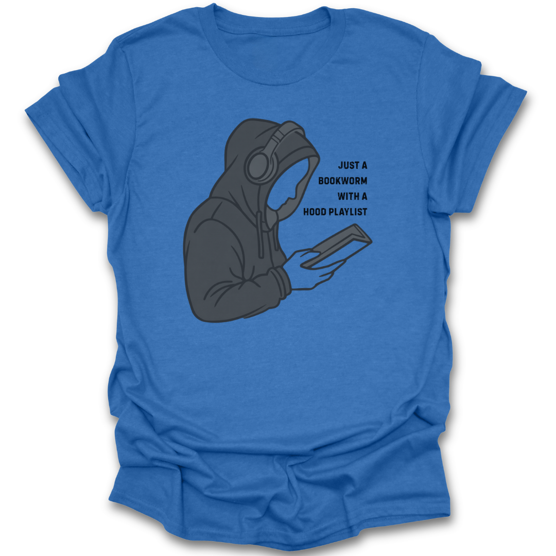 Blue t-shirt with a graphic of a person in a hoodie holding a book and headphones, with text 'Just a bookworm with a hood playlist'. funny book reading literary t shirt