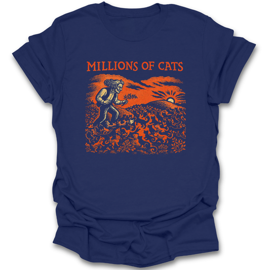 Blue t-shirt with 'Millions of Cats' graphic design on a white background millions of cats shirt, classic picture book shirt, children’s literature shirt, vintage illustration t-shirt, book lover shirt, cat lover book shirt, librarian gift, teacher gift, literary t-shirt, classic book apparel