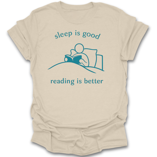 Beige t-shirt with blue graphic and text 'sleep is good, reading is better' on a white background book t shirt