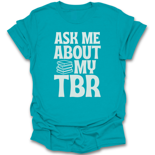 Turquoise t-shirt with 'Ask Me About My TBR' text on a white background funny book reading literary t shirt