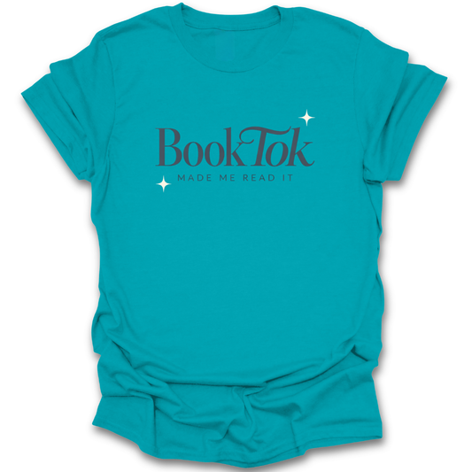 Turquoise t-shirt with 'BookTok Made Me Read It' text on a white background funny book reading literary t shirt