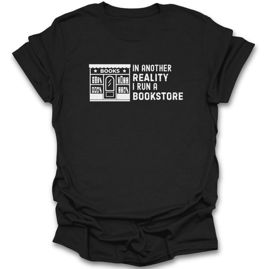 Black t-shirt with white text graphic and bookstore illustration on a white background funny book reading literary t shirt