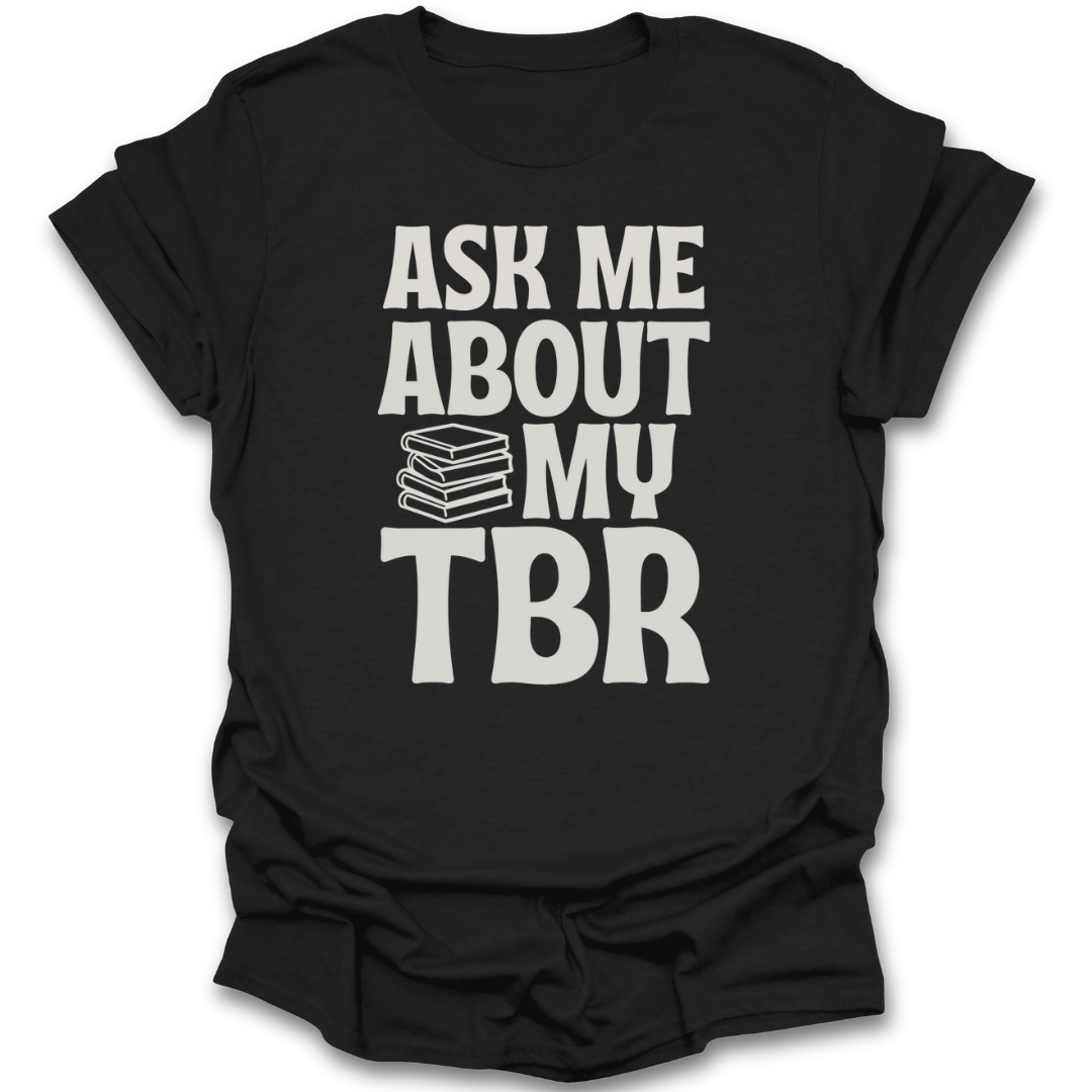 Black t-shirt with 'Ask Me About My TBR' text and book emoji on a white background funny book reading literary t shirt
