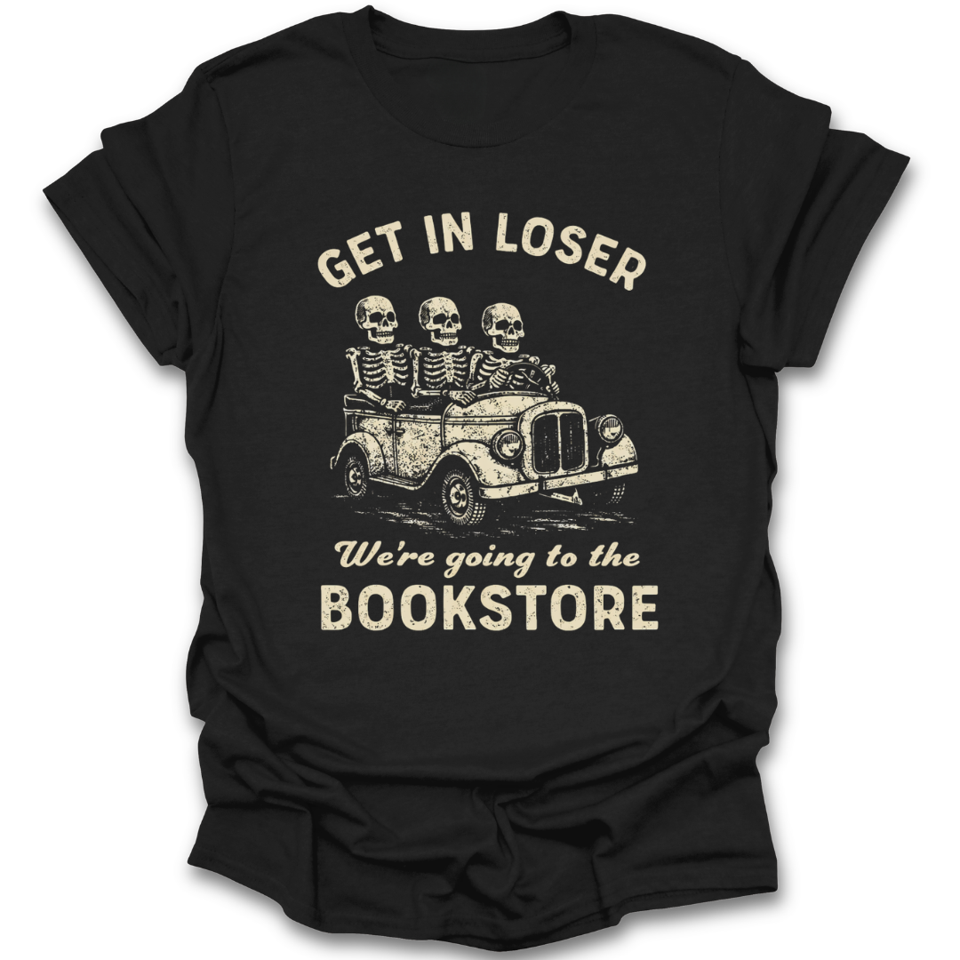 Black t-shirt with skeleton graphic and text 'Get in loser, we're going to the bookstore' on a white background funny book reading literary t shirt