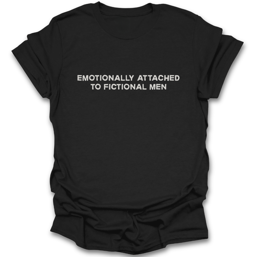Black t-shirt with white text 'EMOTIONALLY ATTACHED TO FictioNal MEN' on a white background funny book reading literary t shirt