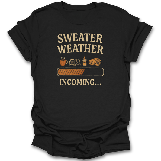 Black t-shirt with 'Sweater Weather Incoming' text and graphics on a white background autumn cozy book reading t shirt