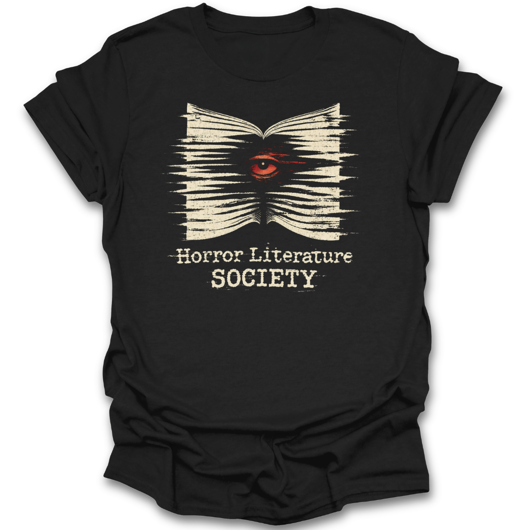 Black t-shirt with a graphic design of an open book with an eye and text 'Horror Literature Society' on a white background. horror literature shirt, horror book shirt, book lover shirt, horror reader gift, gothic book shirt, dark academia shirt, spooky bookish shirt, literature society tee, horror books apparel, bookworm shirt.&nbsp;