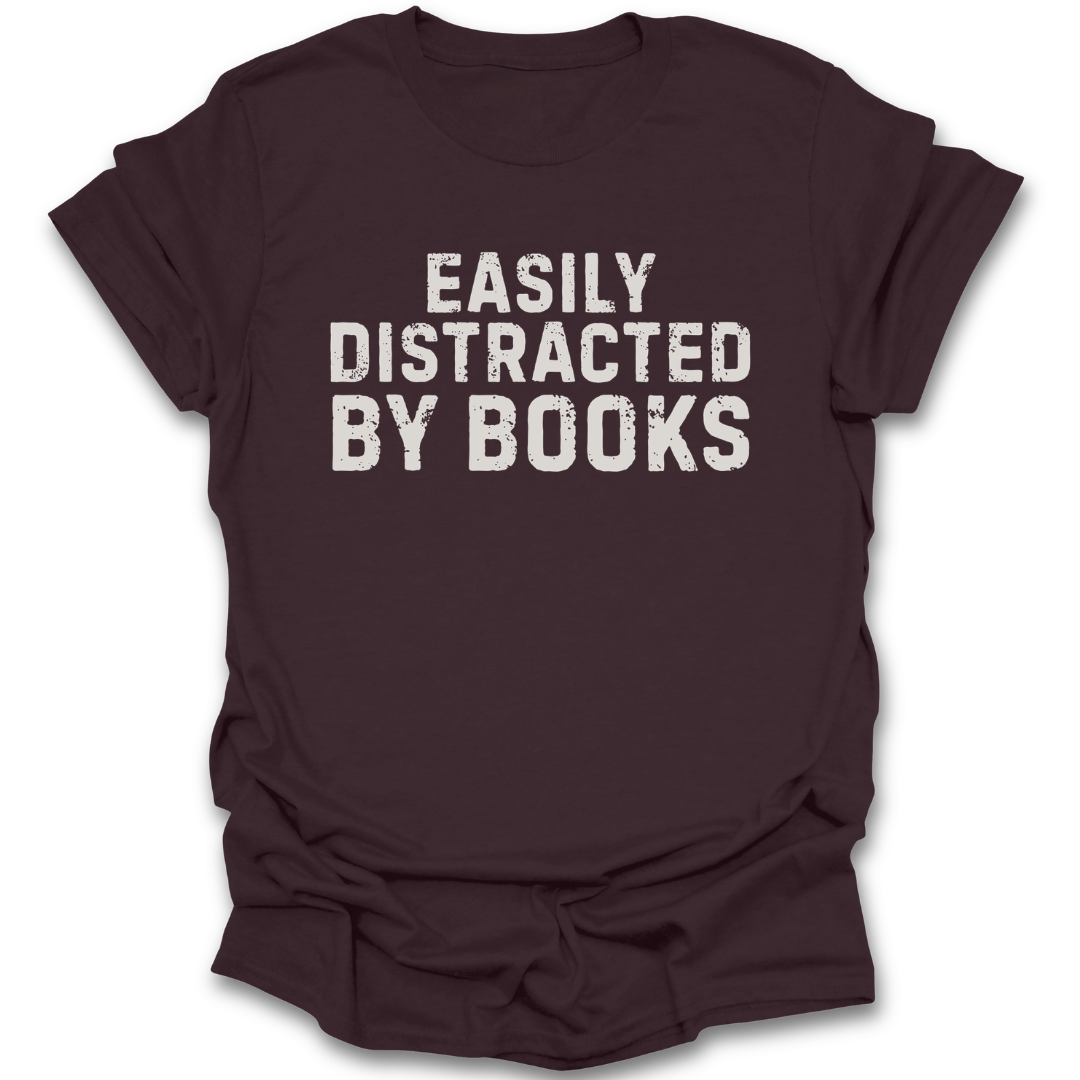 Brown t-shirt with 'Easily Distracted by Books' text on a white background funny book reading literary t shirt
