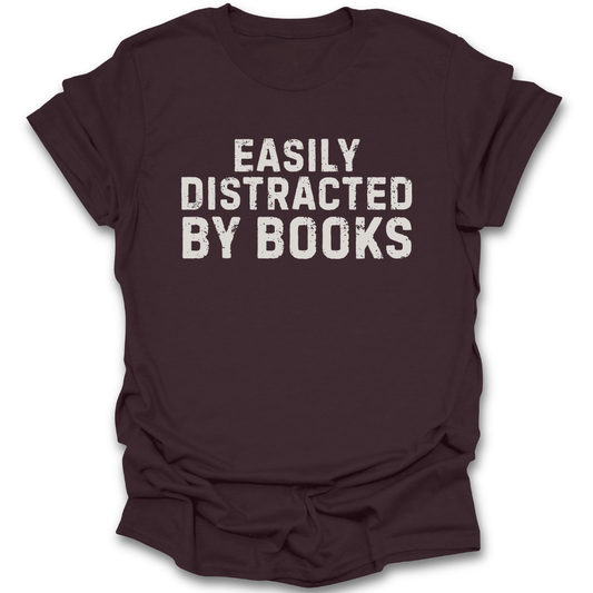 Brown t-shirt with 'Easily Distracted by Books' text on a white background funny book reading literary t shirt
