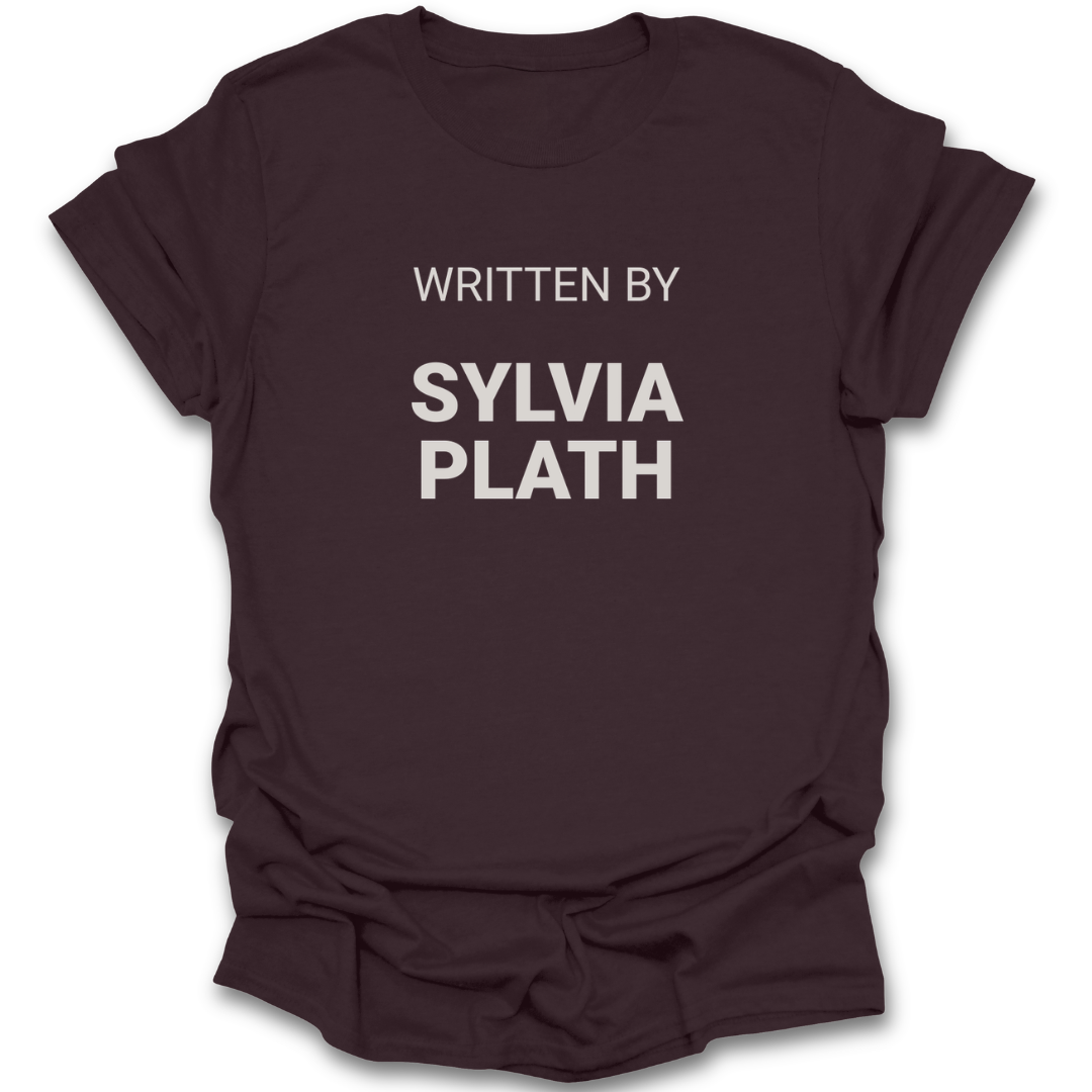 Brown t-shirt with 'WRITTEN BY SYLVIA PLATH' text on a white background poetry funny book reading literary t shirt