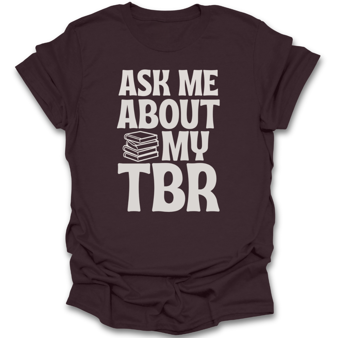 Brown t-shirt with 'Ask Me About My TBR' text and book stack graphic on a white background funny book reading literary t shirt