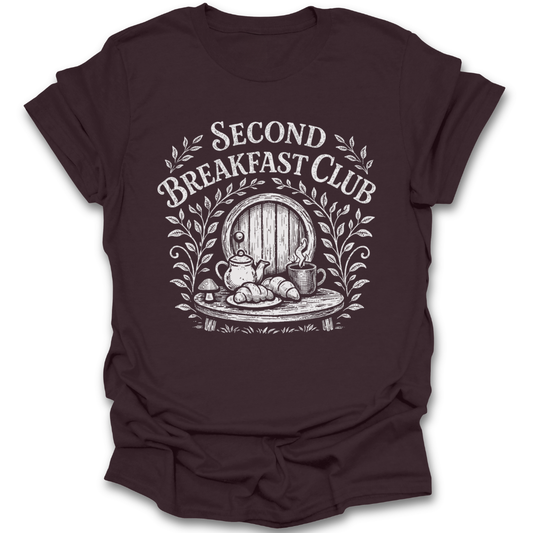 Brown t-shirt with 'Second Breakfast Club' graphic design on a white background. second breakfast shirt, book lover cozy tee, fantasy reader shirt, bookish aesthetic shirt, bibliophile gift, cozy reading apparel, bookworm shirt, cottagecore book tee LOR hobbit