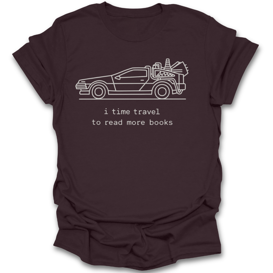 Brown t-shirt with a graphic of a car and text 'i time travel to read more books' on a white background science fiction sci fi funny book reading literary t shirt