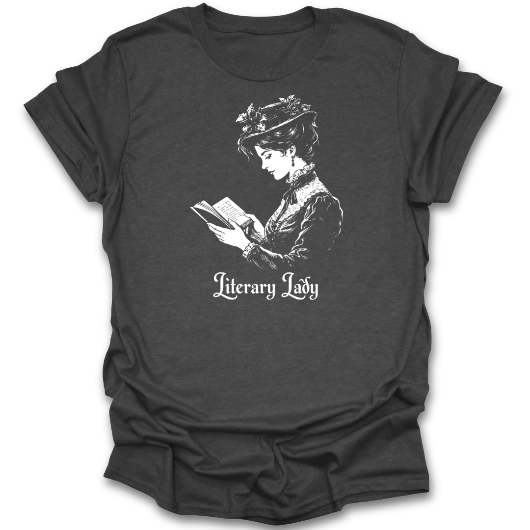 Black t-shirt with a graphic of a woman reading a book and the text 'Literary Lady' on a white background.  funny book reading literary t shirt