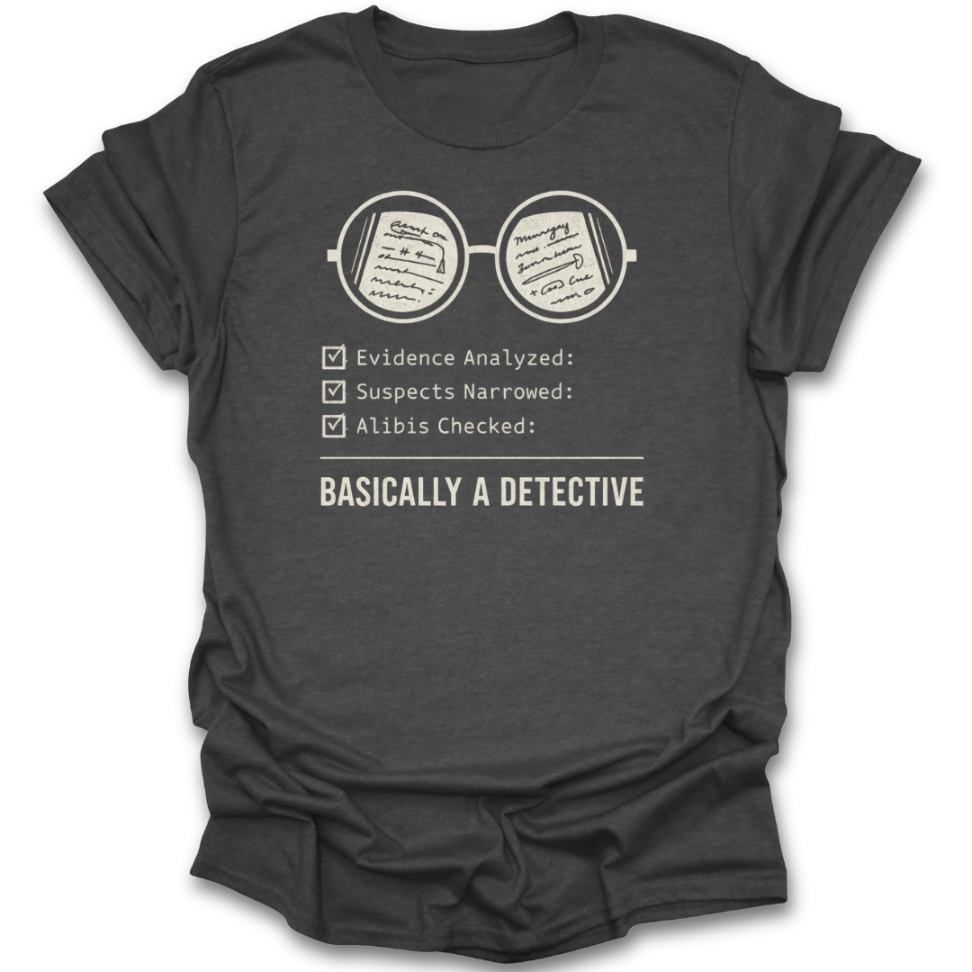 Dark gray t-shirt with a graphic and text about being a detective on a white background mystery book shirt, detective book lover shirt, book lover shirt, mystery reader gift, cozy mystery shirt, thriller reader shirt, Sherlock Holmes gift, bookworm apparel, reader gift, bibliophile shirt.
