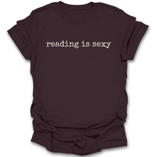 Brown t-shirt with 'reading is sexy' text on a white background  funny book reading literary t shirt