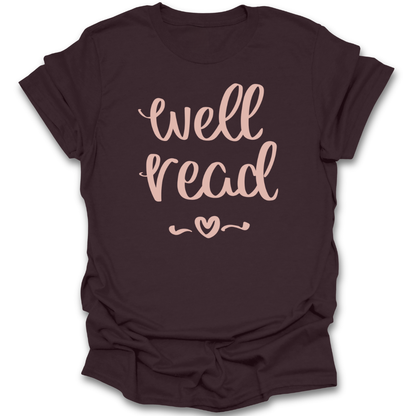 Brown t-shirt with 'well read' text in pink on a white background book reading literary t shirt