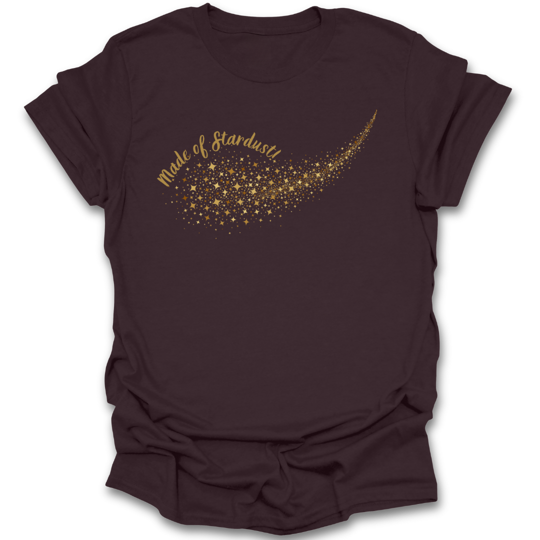 Brown t-shirt with gold 'Made of Stardust' design on a white background