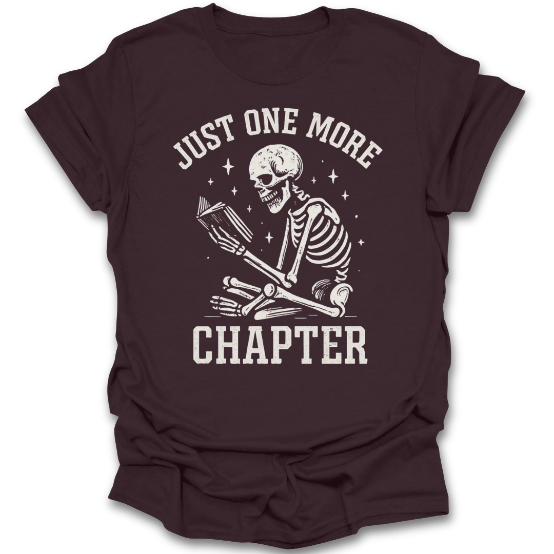Brown t-shirt with skeleton design and 'Just One More Chapter' text on a white background funny book reading t shirt