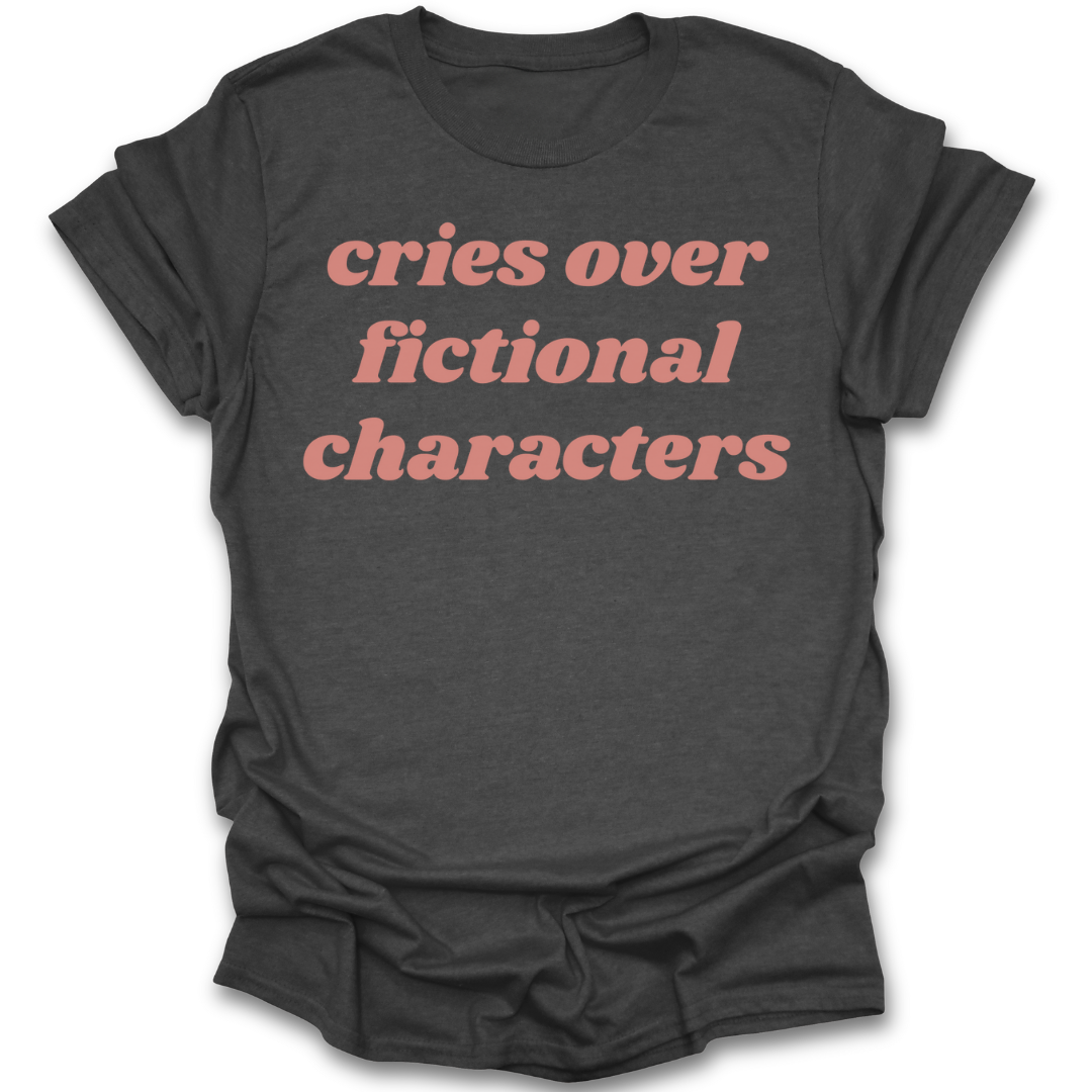 Black t-shirt with red text 'cries over fictional characters' on a white background romance tee t shirt