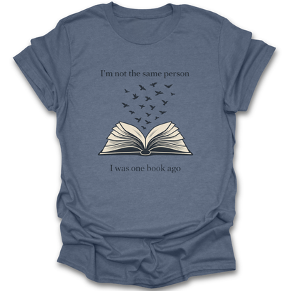 Blue t-shirt with an open book graphic and text on a white background  book reading literary t shirt