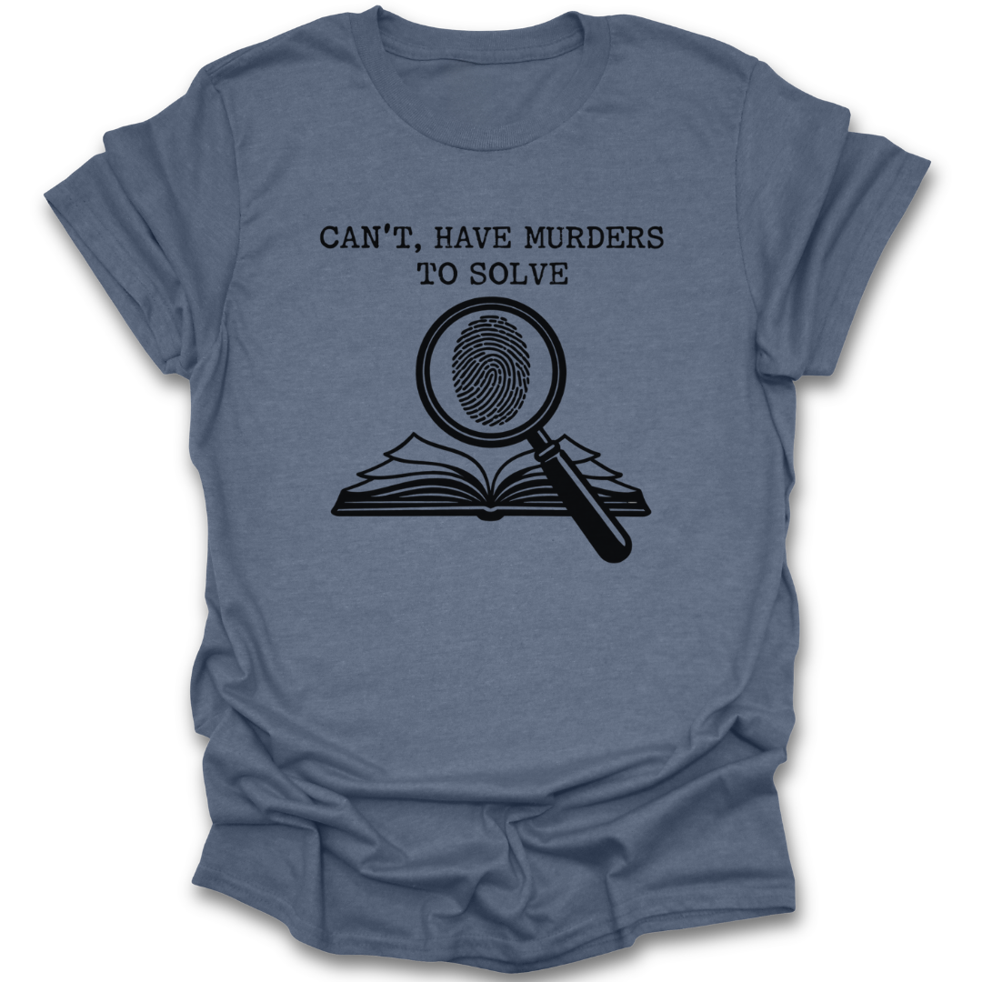 Blue t-shirt with black graphic and text 'Can't, have murders to solve' on a white background true crime thriller mystery funny book reading literary t shirt