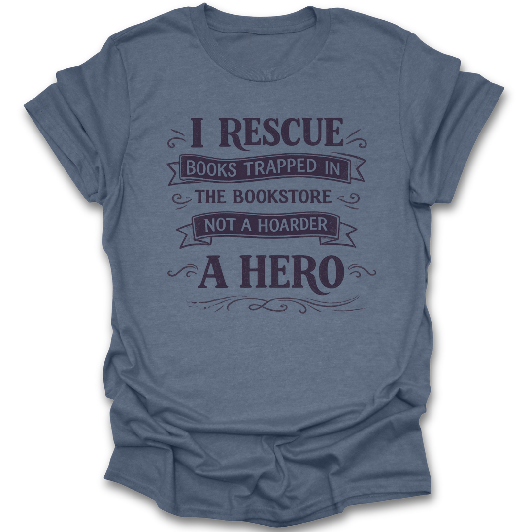 Blue t-shirt with text 'I Rescue Books Trapped in the Bookstore Not a Hoarder A Hero' on a white background funny book reading literary t shirt