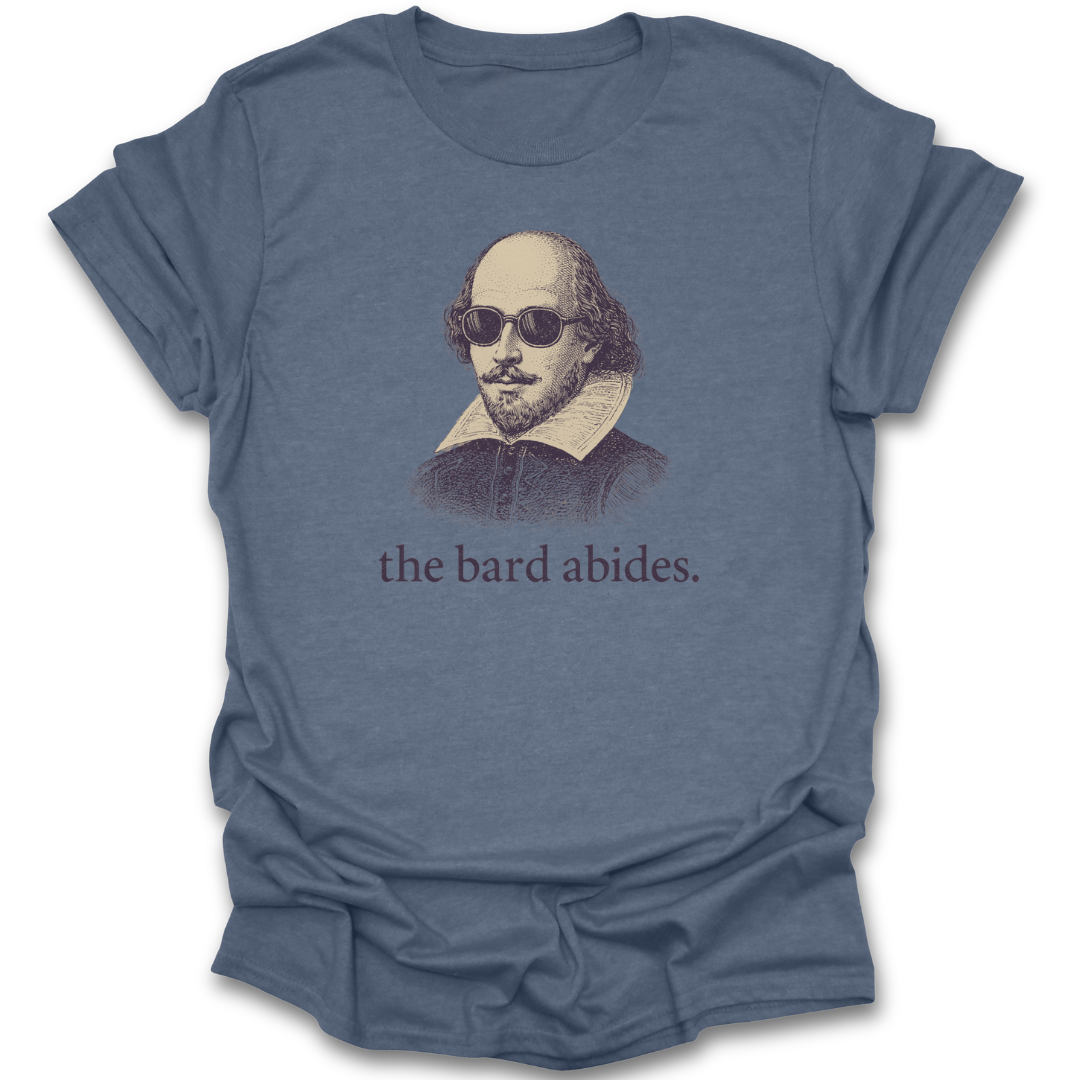 Blue t-shirt with a graphic of Shakespeare wearing sunglasses and the text 'the bard abides' on a white background. funny book reading literary t shirt