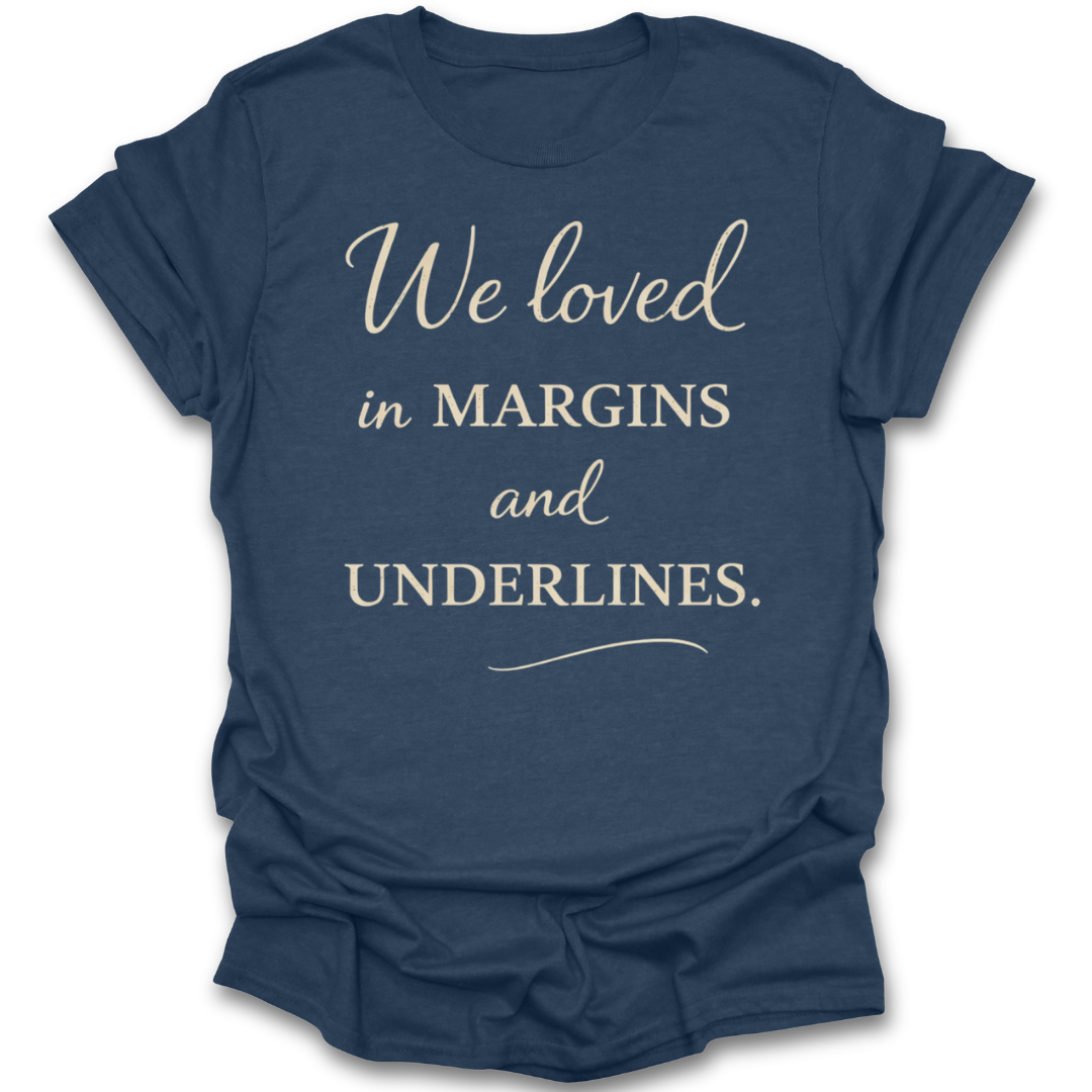 Blue t-shirt with white text 'We loved in MARGINS and UNDERLINES' on a white background romance book reading literary t shirt