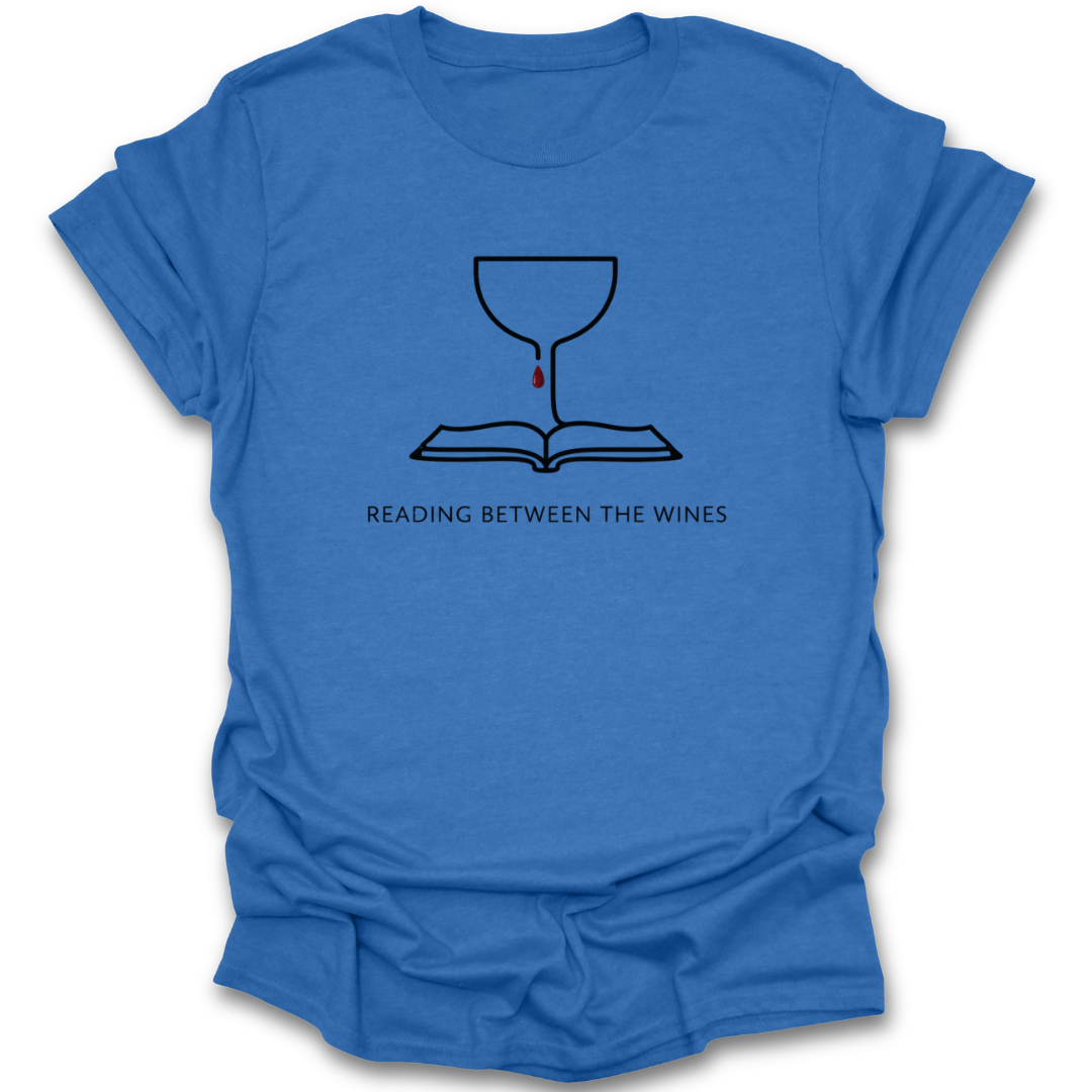 Blue t-shirt with a graphic design and text 'Reading Between the Wines' on a white background book lover shirt, reading shirt, wine lover shirt, funny book shirt, book club shirt, bibliophile gift, reader gift, bookworm shirt, literary shirt, wine and books shirt, funny reader tee, bookish apparel, bookstore shirt, librarian gift.