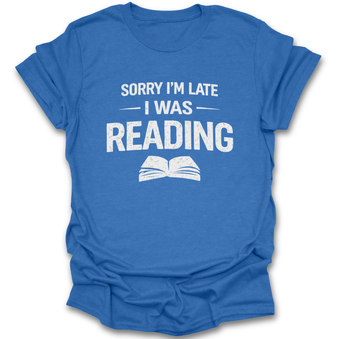 Blue t-shirt with white text 'Sorry I'm late I was reading' on a white background funny book reading literary t shirt