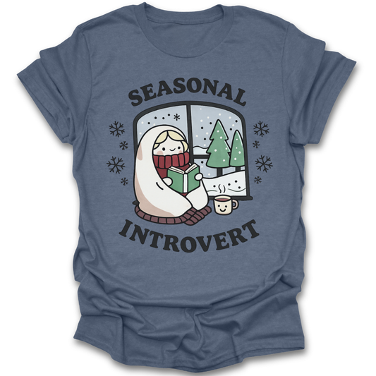 Blue t-shirt with 'Seasonal Introvert' graphic design on a white background book lover t shirt