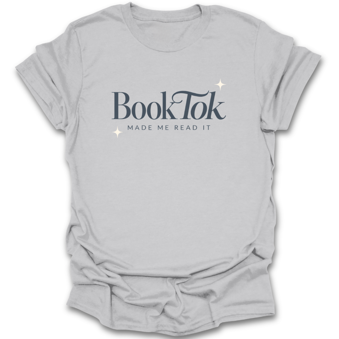 Gray t-shirt with 'BookTok Made Me Read It' text on a white background funny book reading literary t shirt