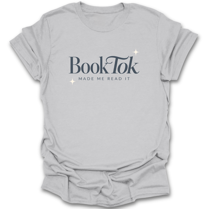 Gray t-shirt with 'BookTok Made Me Read It' text on a white background funny book reading literary t shirt