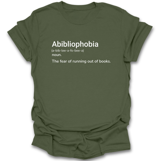 Green t-shirt with 'Abibliophobia' definition text on a white background funny book reading literary t shirt