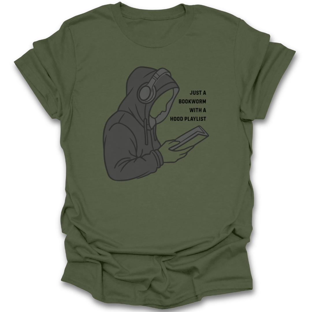 Green t-shirt with a graphic of a person in a hoodie holding a book and text 'Just a bookworm with a hood playlist'. funny book reading literary t shirt