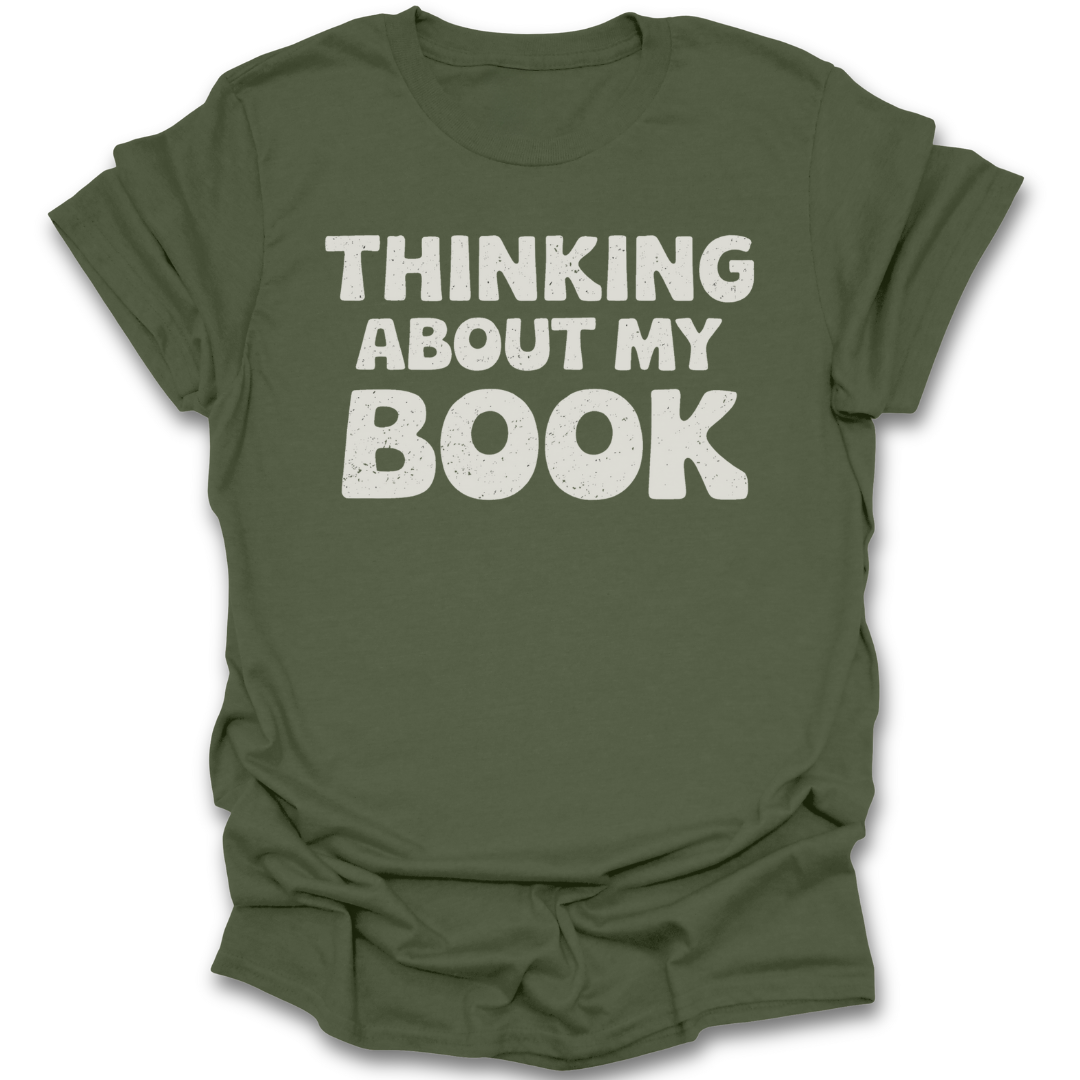 Green t-shirt with 'Thinking About My Book' text on a white background funny book reading literary t shirt