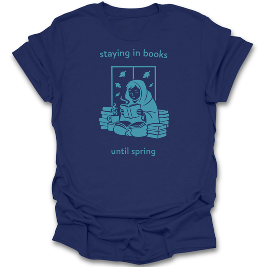 Navy blue t-shirt with a graphic of a person reading a book and text 'staying in books until spring' on a white background funny book reading literary t shirt