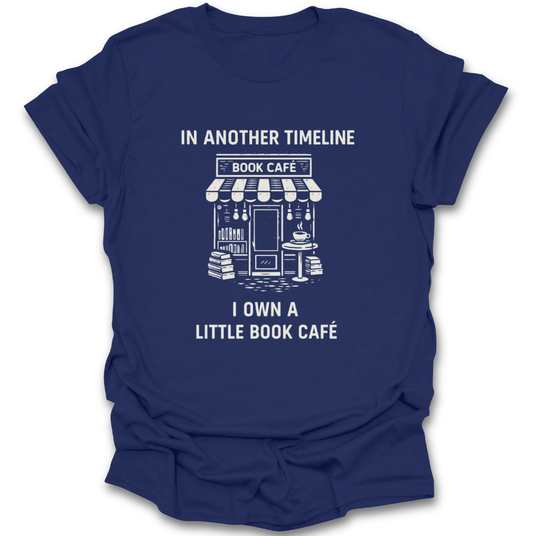 Blue t-shirt with white text and graphic of a book café on a white background funny book reading literary t shirt