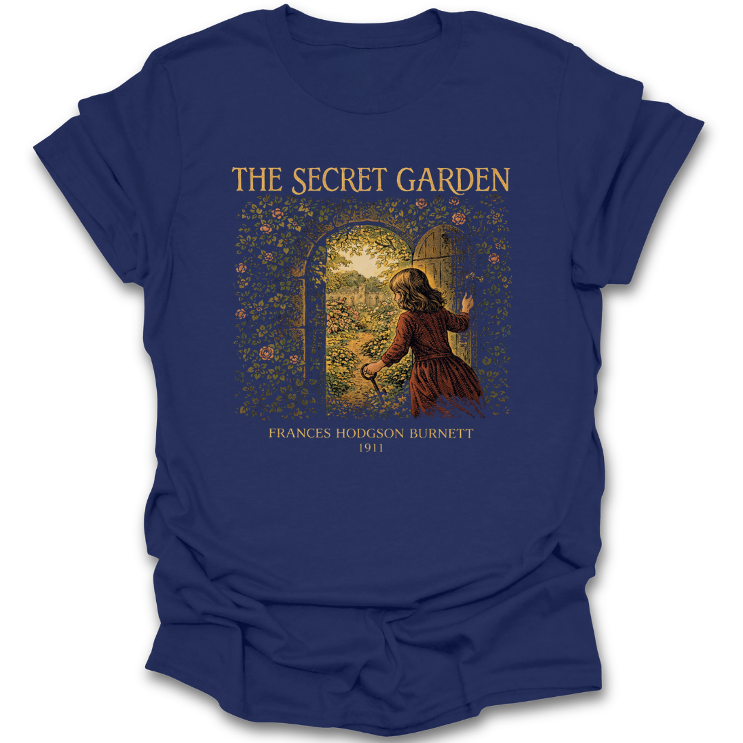 Blue t-shirt with 'The Secret Garden' graphic and text on a white background. he secret garden shirt, frances hodgson burnett shirt, classic book t-shirt, literary shirt, book lover gift, children’s literature shirt, vintage book tee, reader apparel, librarian gift, teacher gift