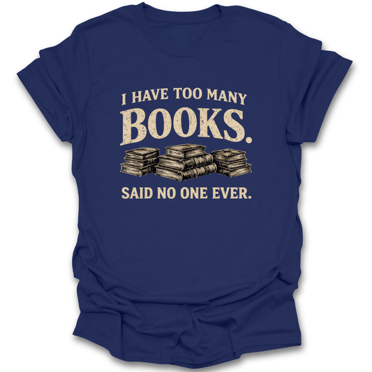 Blue t-shirt with 'I have too many books. Said no one ever.' text and book illustrations on a white background funny book reading literary t shirt