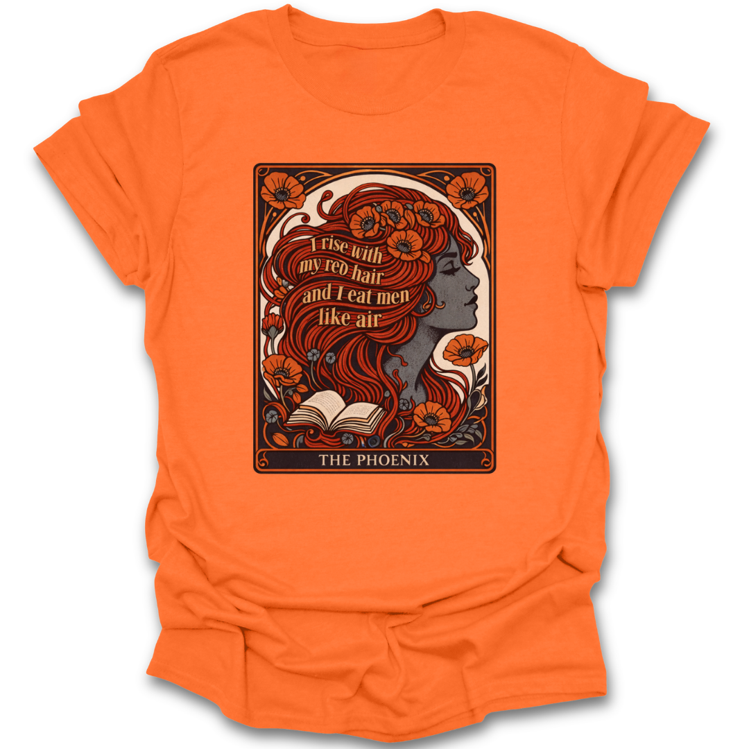 Orange t-shirt with a graphic design of a woman with red hair and text on a white background plath poem phoenix poetry book reading literary t shirt