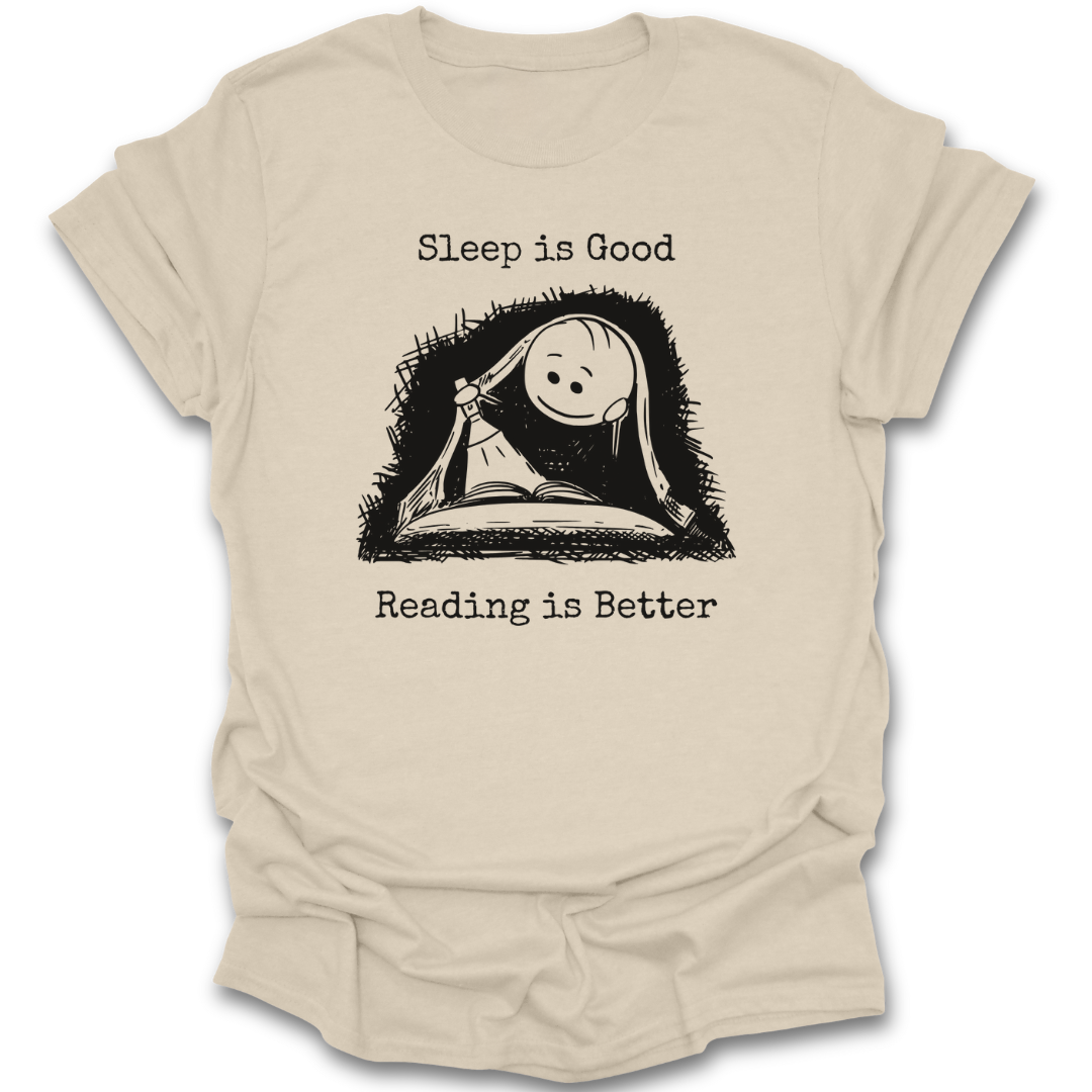 Beige t-shirt with a graphic of a book and sleeping face, text 'Sleep is Good Reading is Better' on a white background. cute  funny book reading literary t shirt