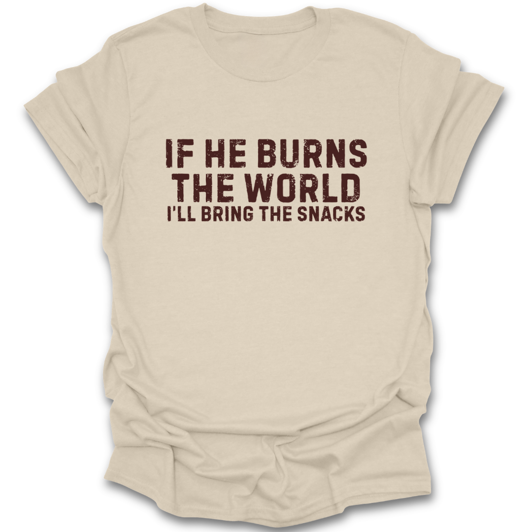 Beige t-shirt with brown text 'If he burns the world, I'll bring the snacks' on a white background romantasy fantasy  funny book reading literary t shirt